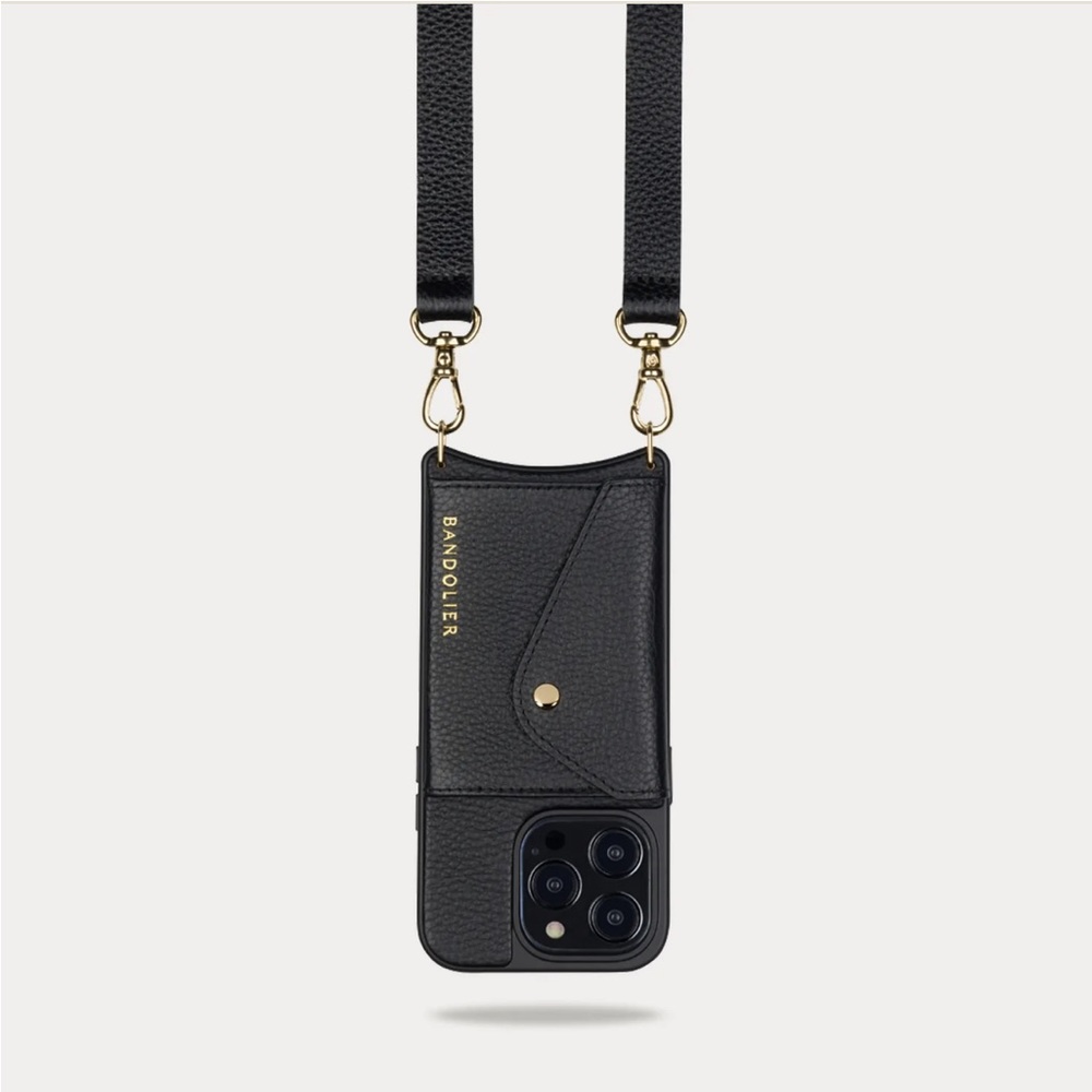 Bandolier HAILEY
Side Slot Leather Crossbody Bandolier in Black/Gold